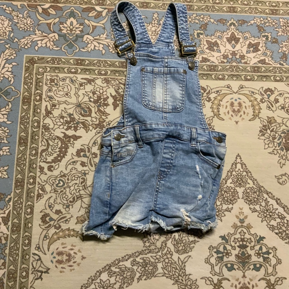 (Girls 8-10 light blue overalls)